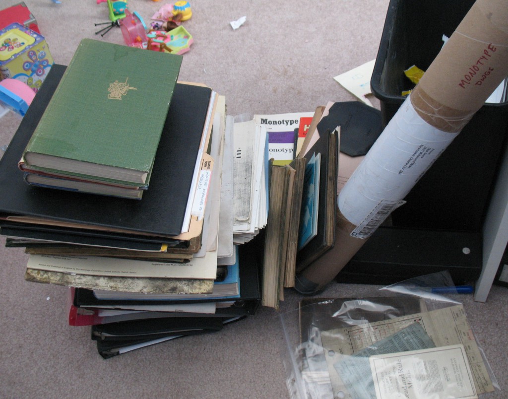 The pile of books I have to catalogue and put bookplates in. It turns out there are a total of 97 documents there.