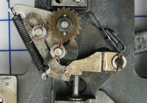 The pawl has been engaged in the ratchet wheel by the actuator piston.