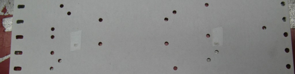 Small holes patched with correction tape