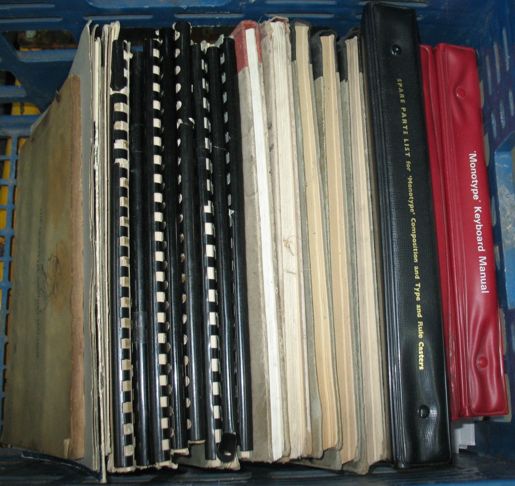 Multiple copies of various parts books such as Lanston's 1955 Plate Book and other manuals.