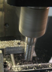 Using a ⅜″ roughing mill to remove most of the excess metal.