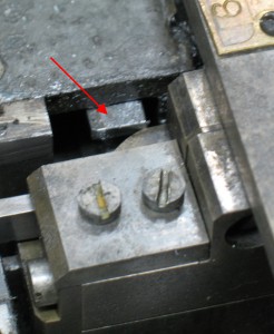 The Type Pusher (arrow) crashing into the Lead and Rule mould if not removed