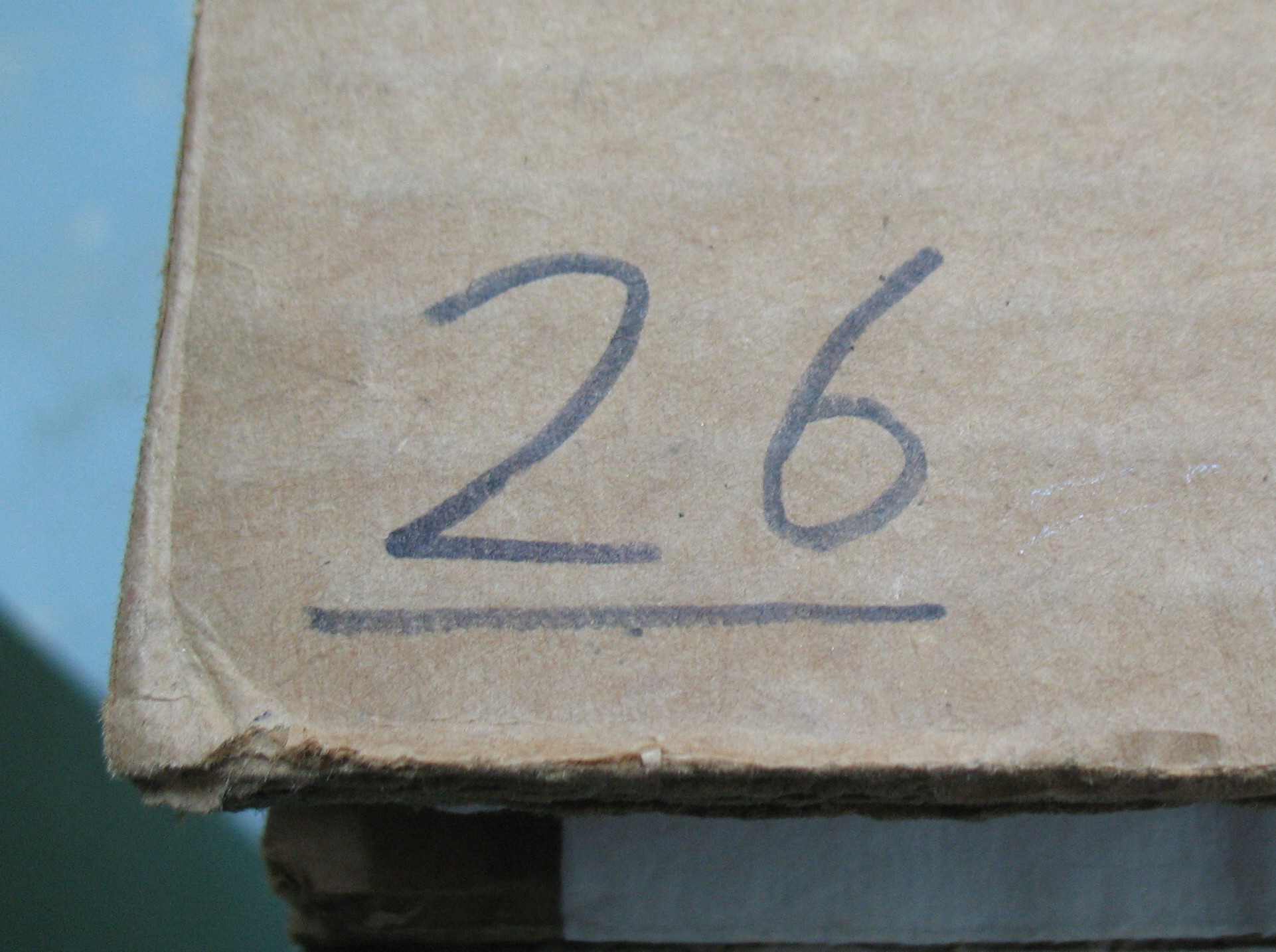 Numbering the cardboard sheets helps track which sheets belong to whom in a group workshop.