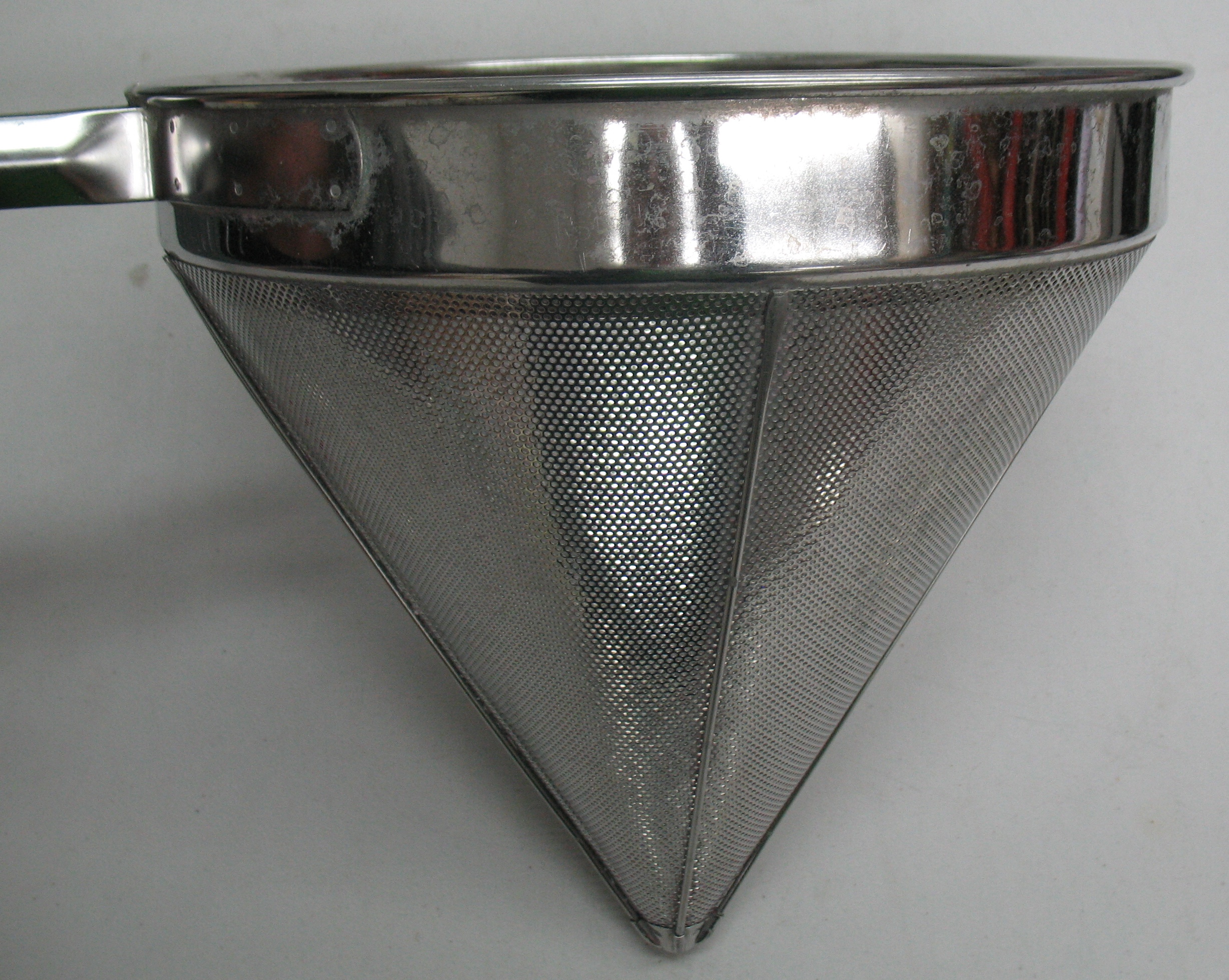 Side view of the large strainer. The perspective makes the cone appear shorter than it actually is.
